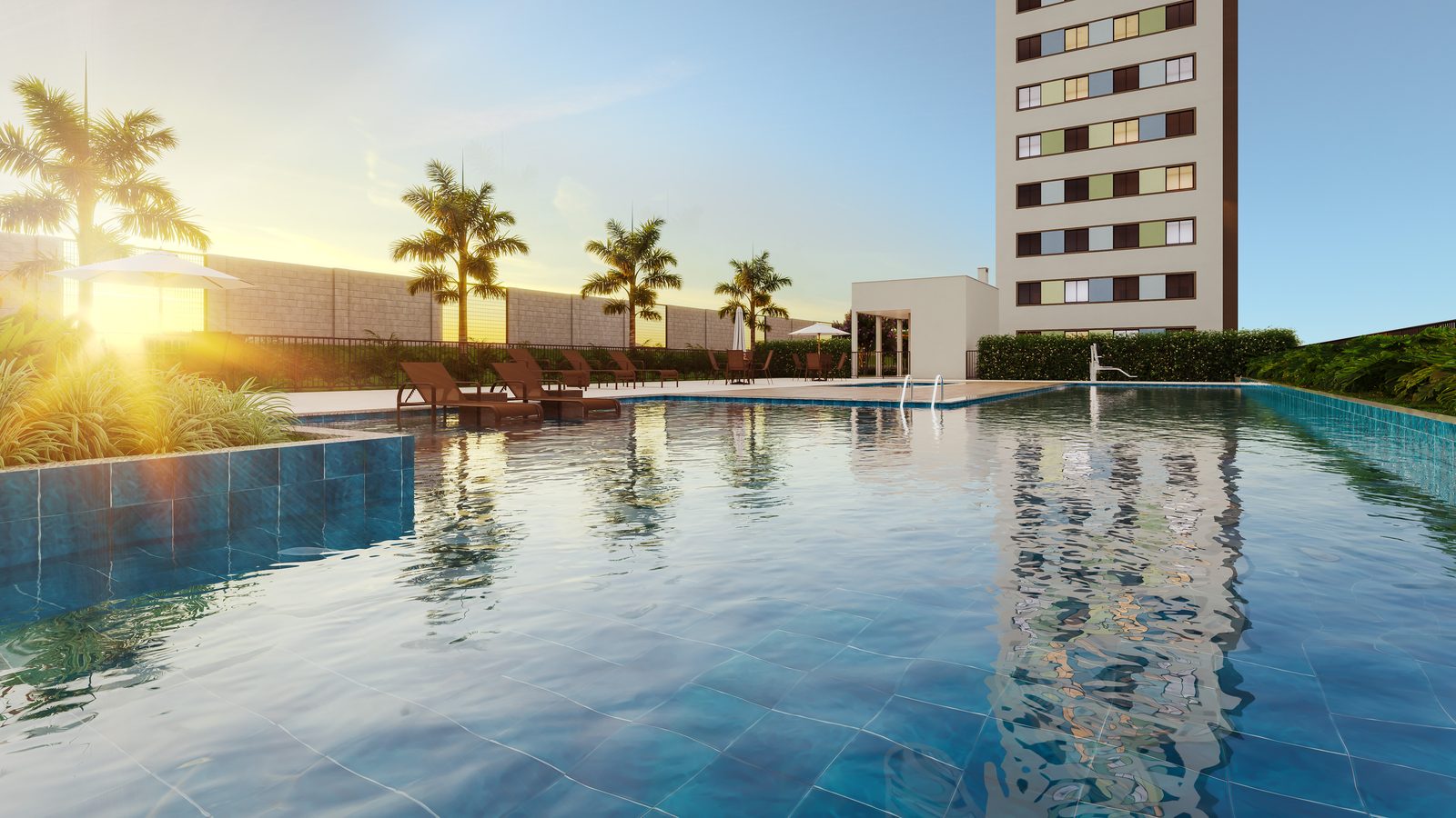 Piscina do Residencial Maldivas ao pôr do sol